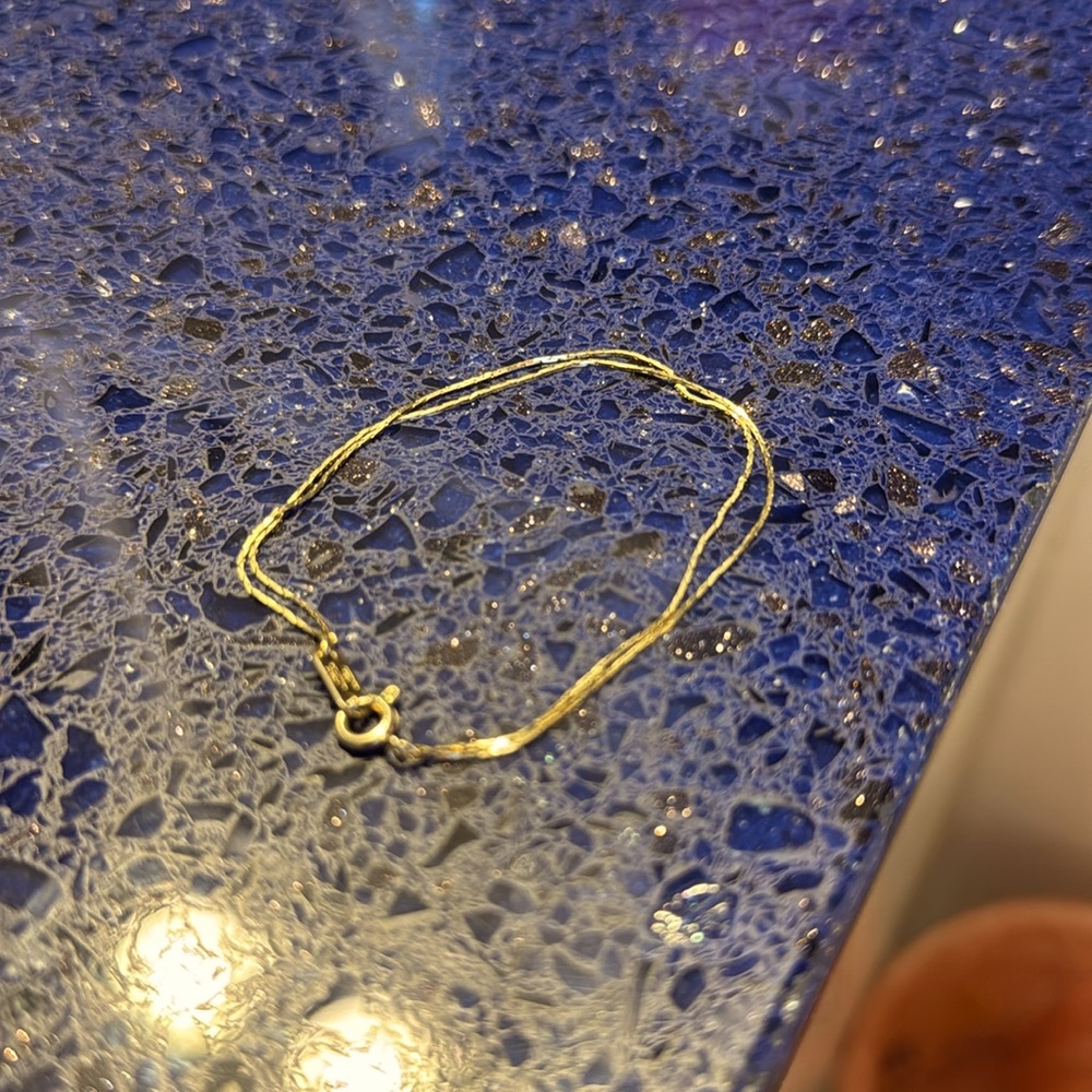 I bought this new, wore it a couple times,realized I like silver more then gold.